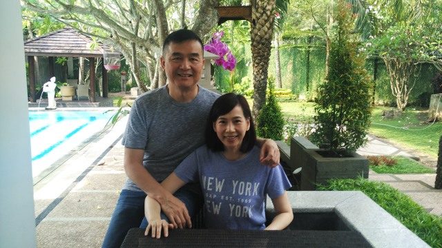 Huang Huan bersama suami
